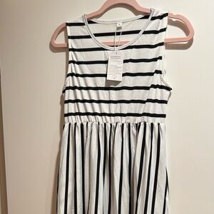 Woman’s stripped dress in small